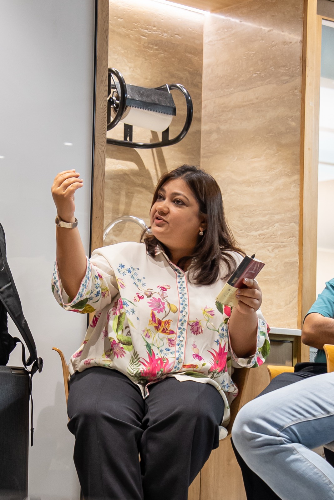 An attendee raising a hand during the Q and A at Miles Ahead Delhi