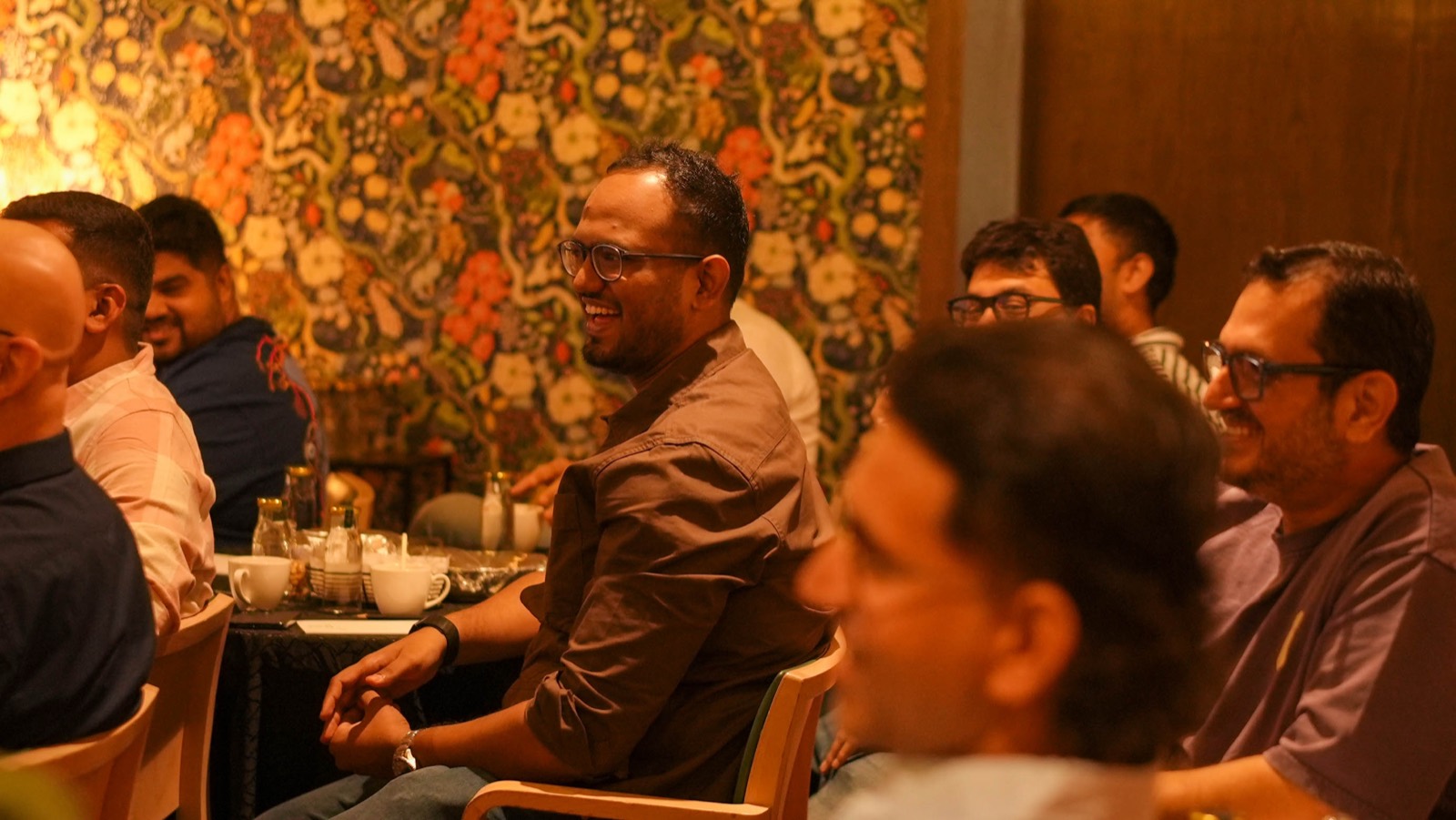 An attendee laughing during a session at Miles Ahead Mumbai