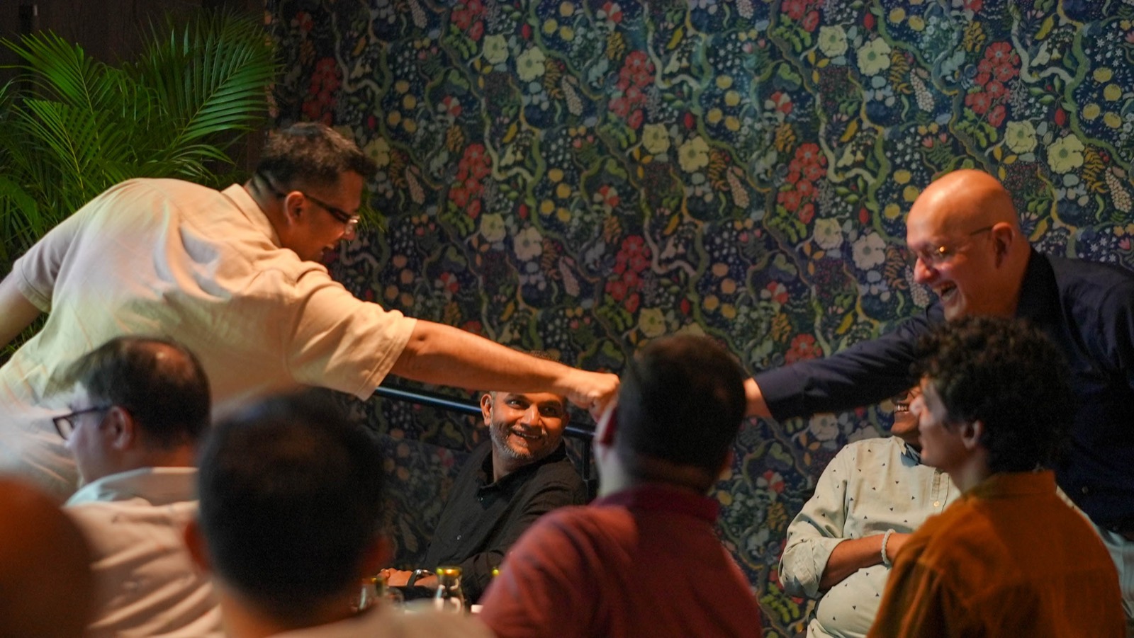 Attendees greeting each other at Miles Ahead Mumbai