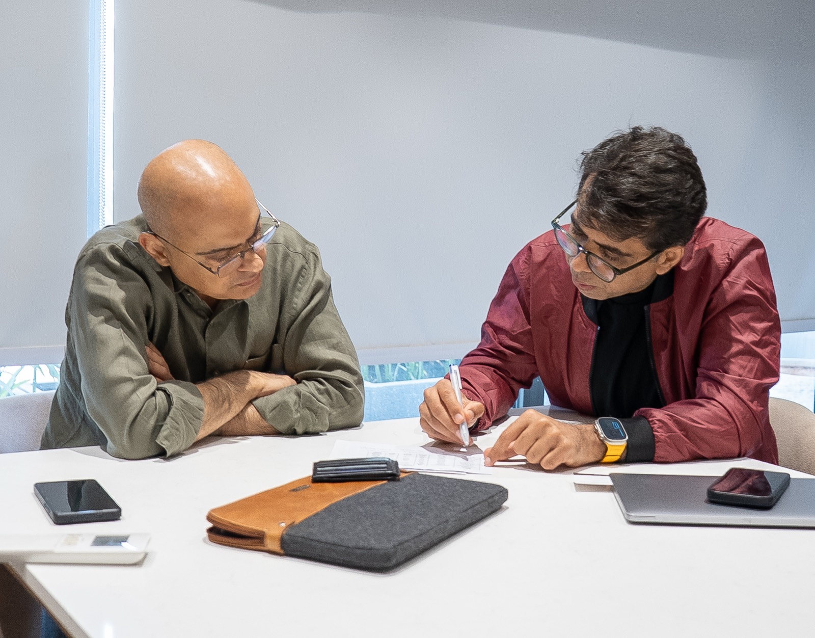 Two attendees working through an award search at Miles Ahead Delhi