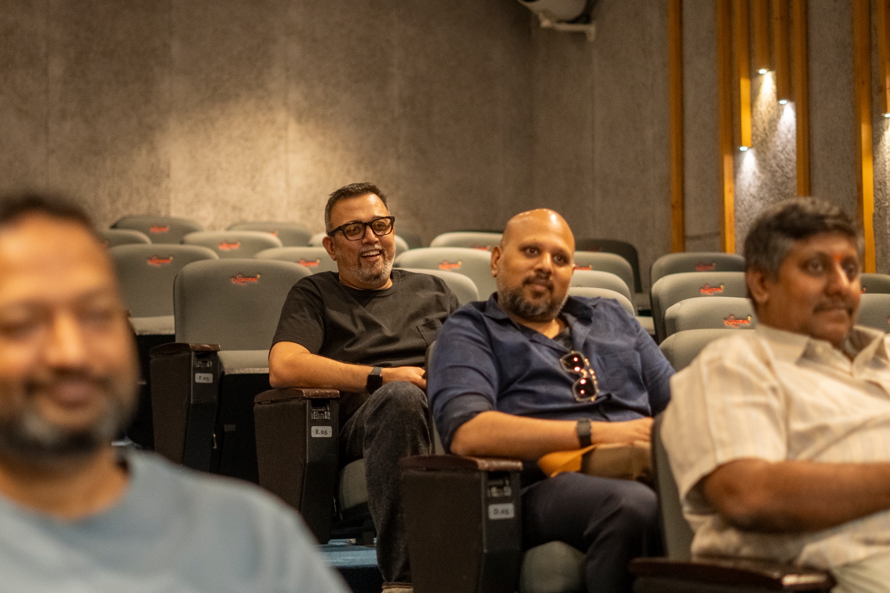 Attendees in the auditorium