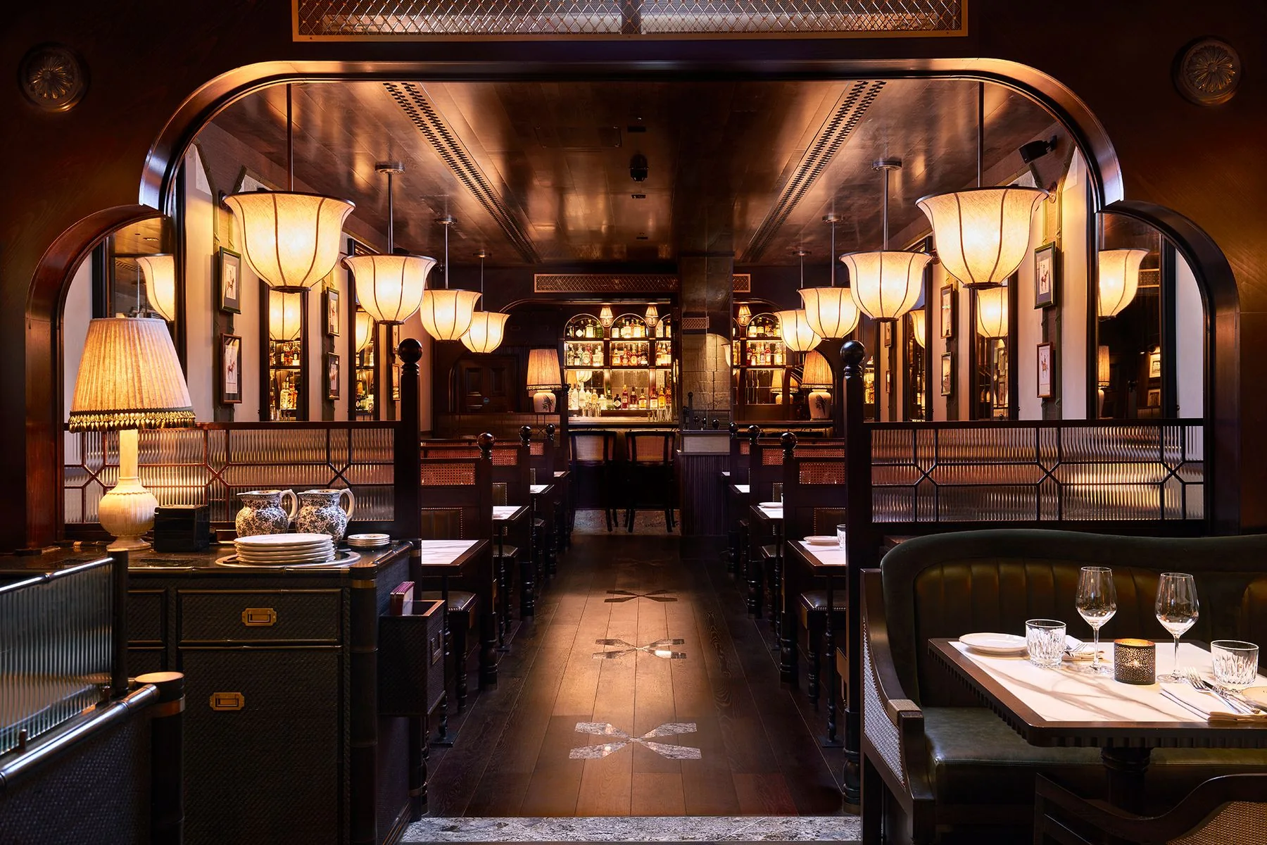 The jade-green ground-floor dining room at Gymkhana, Mayfair