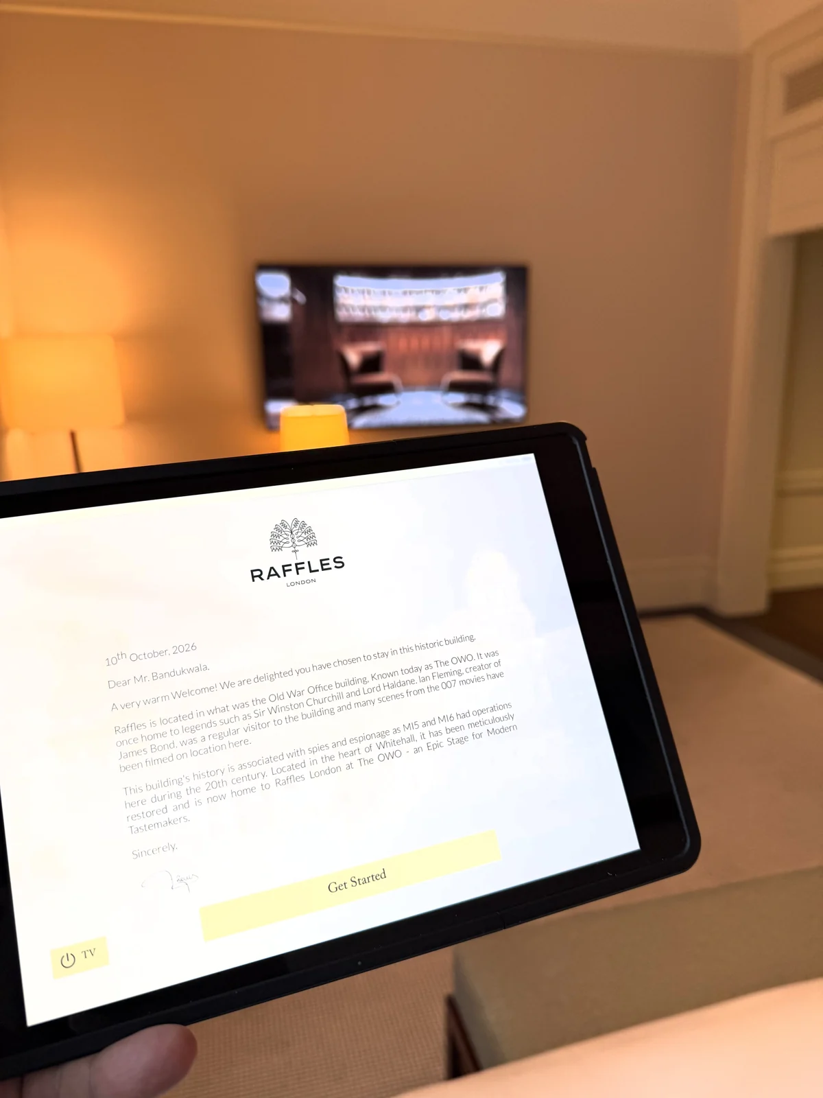 Digital welcome letter on a tablet at Raffles London at The OWO