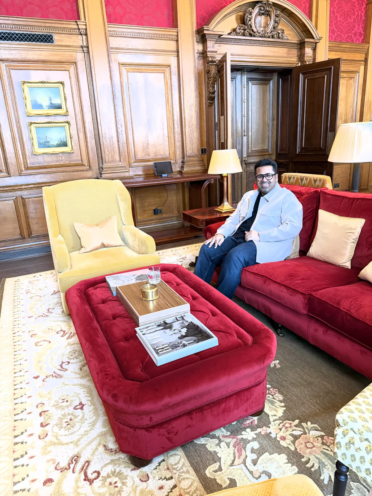 Red velvet sofas in the Haldane Suite, the former office of Lord Haldane and Winston Churchill