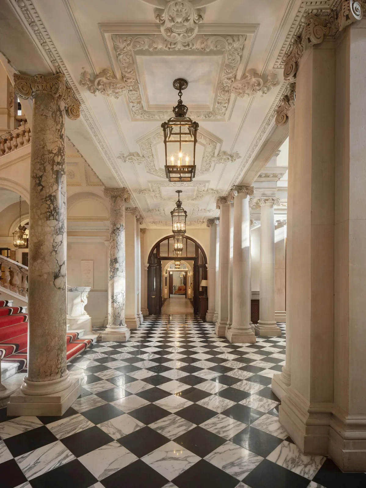 Marble corridor with checkerboard floor inside the Old War Office, Raffles London