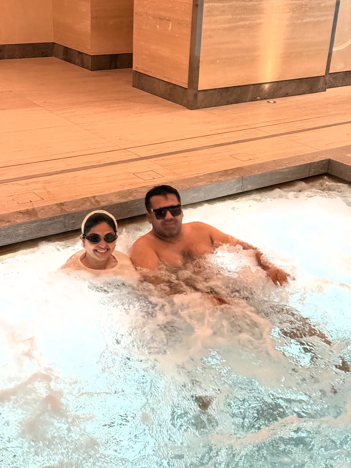 Aadil and Saniya in the vitality pool at the Guerlain Spa, Raffles London